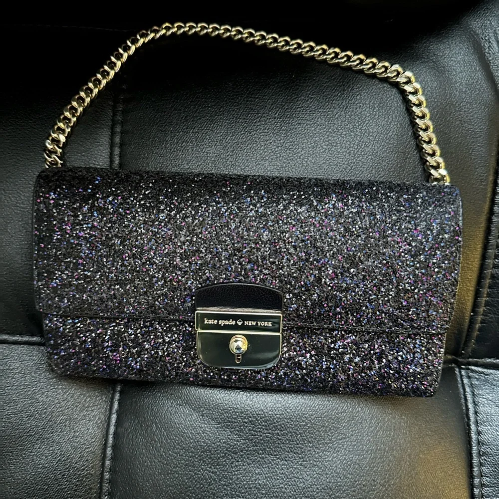kate spade New York black w/multi colored glitter Milou Sunset Lane clutch.